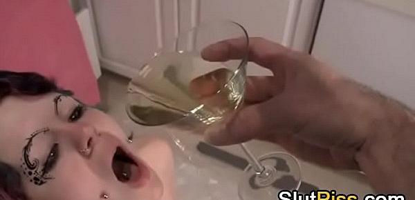  slave goth girl pissing in glass and then drinks her own piss
